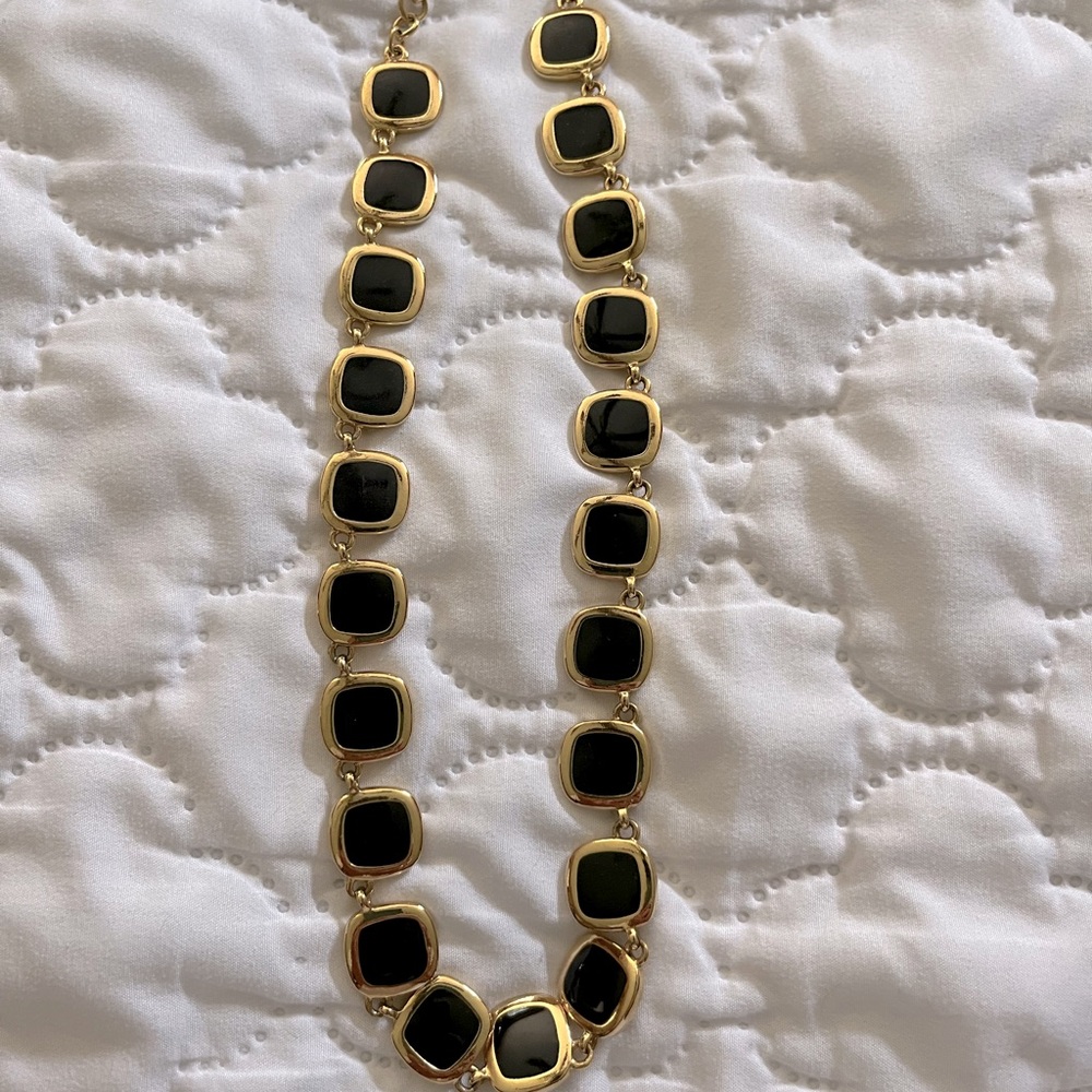 Reversible necklace. Length is 18 inches but is adjustable to be shortened.